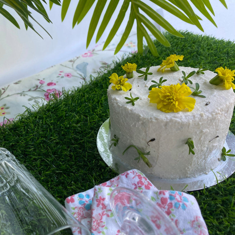 A chicken frosted meat cake for pets on grass